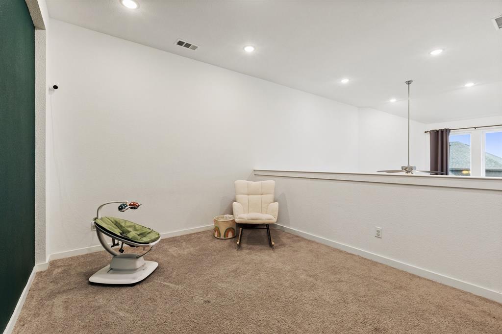 1124 Queensdown Way Forney, TX 75126 - Photo 22 of 34 a bathroom with a sink