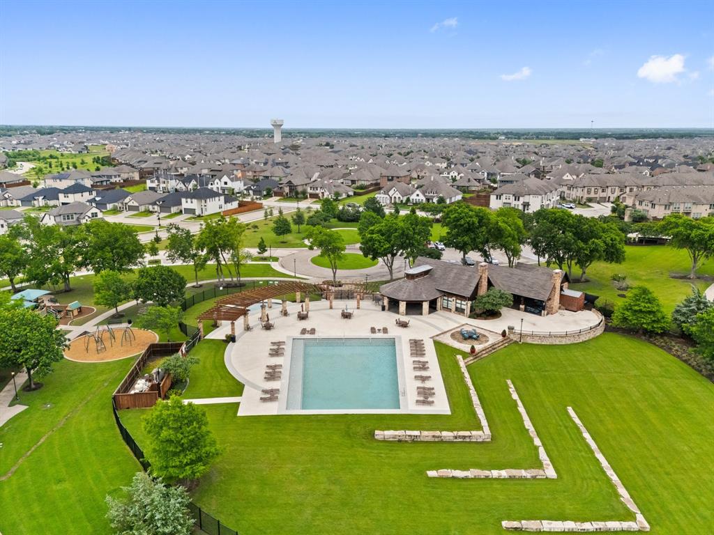 1124 Queensdown Way Forney, TX 75126 - Photo 32 of 34 a view of a city with lawn chairs