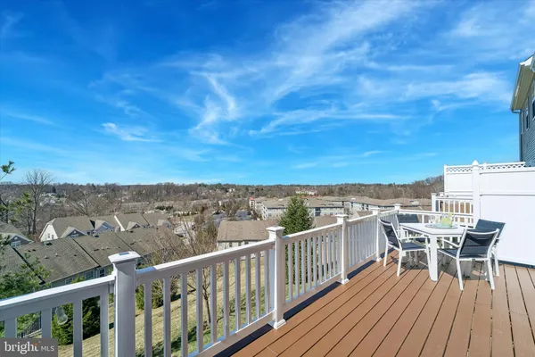 a view of a balcony with chairs
