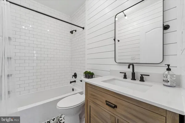 a view of a chairs and table in patio