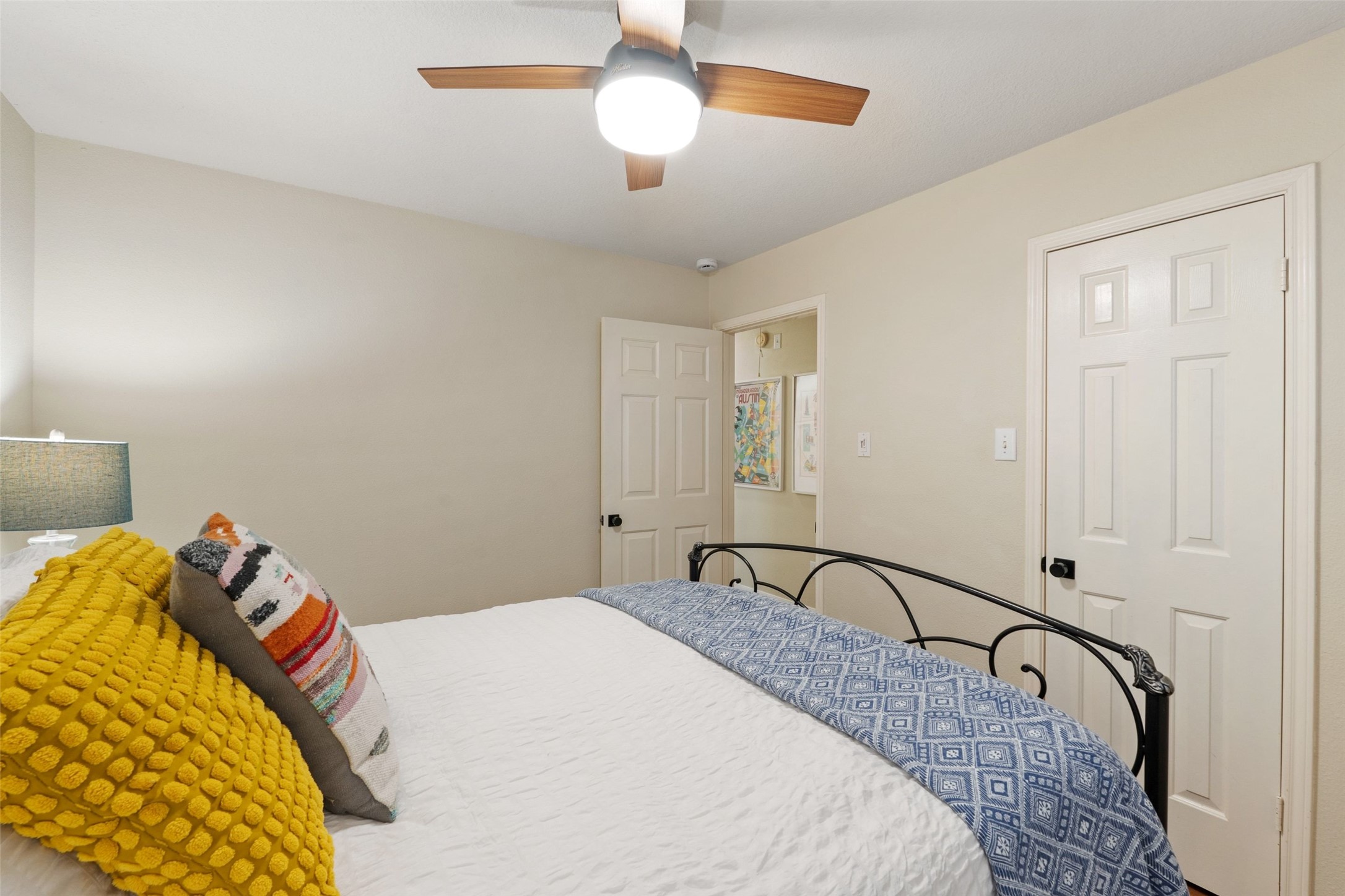 11016 Amaranth Lane Austin, TX 78754 - Photo 24 of 36 a bedroom with a bed and a window