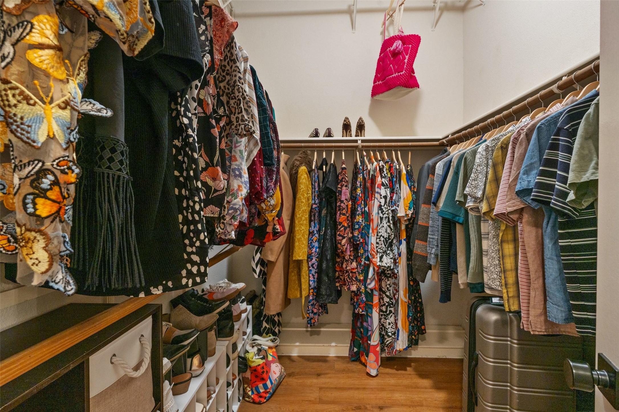 11016 Amaranth Lane Austin, TX 78754 - Photo 27 of 36 a view of walk in closet with clothes