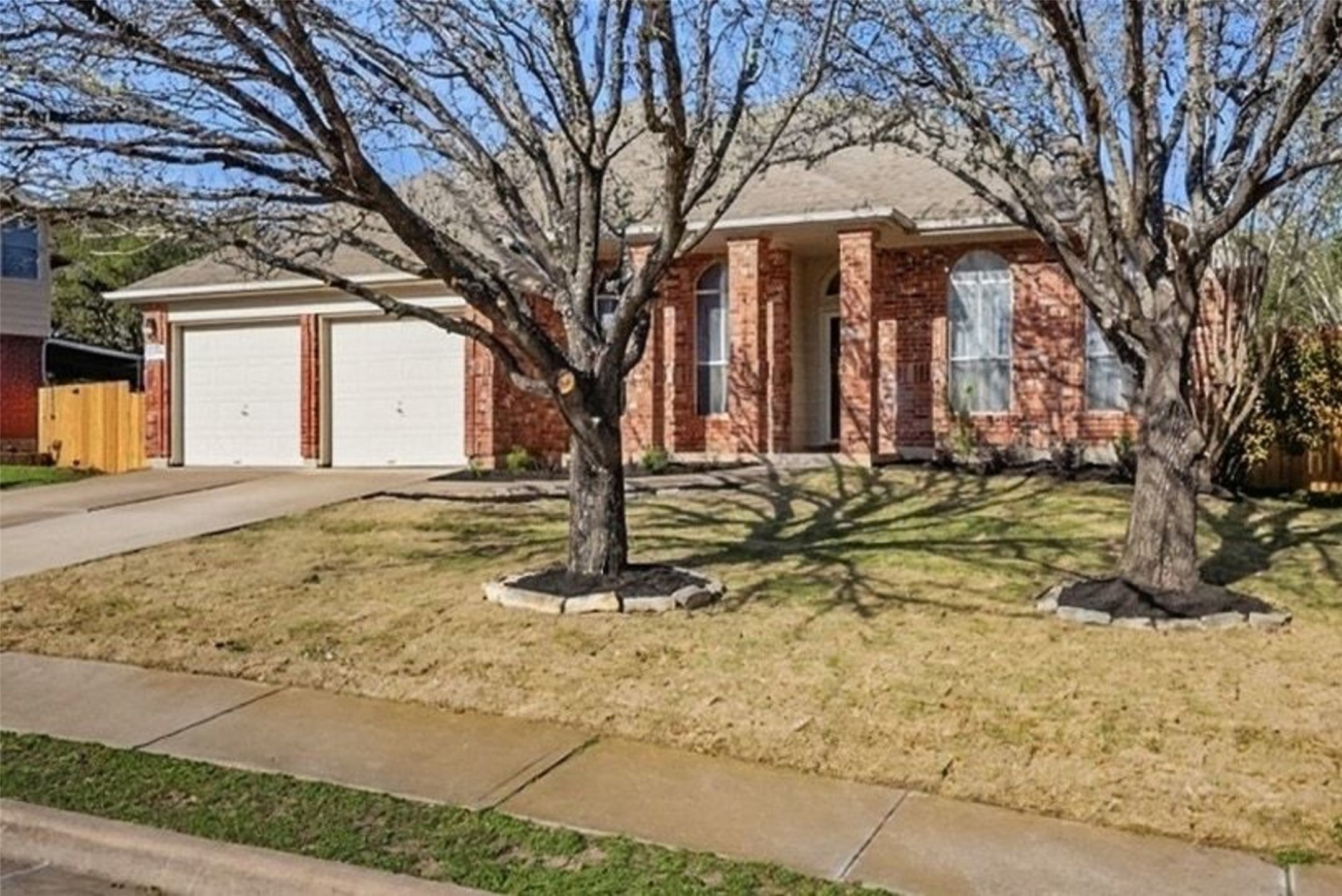 11016 Amaranth Lane Austin, TX 78754 - Photo 35 of 36 a front view of a house with a yard