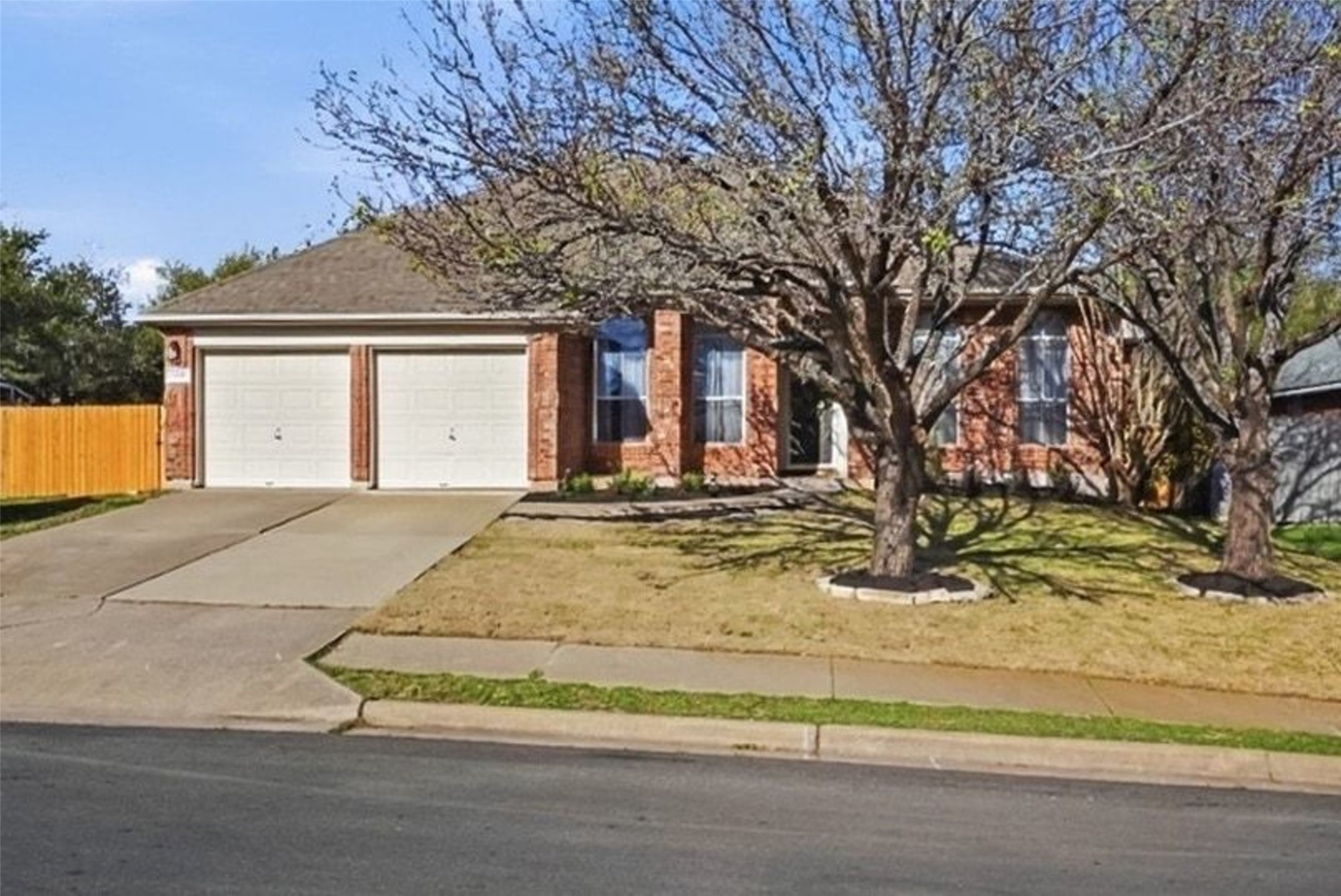 11016 Amaranth Lane Austin, TX 78754 - Photo 36 of 36 a view of the house with snow on the road