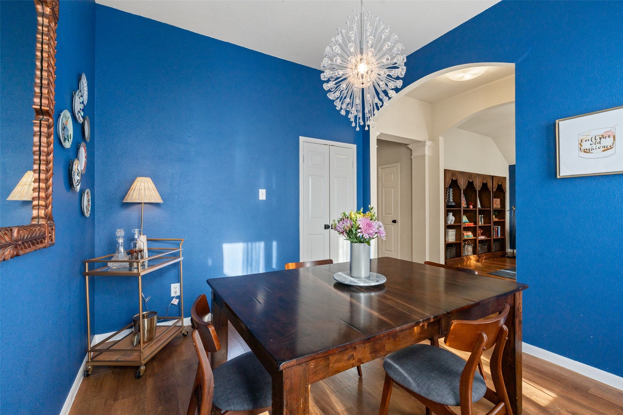 11016 Amaranth Lane Austin, TX 78754 - Photo 4 of 36 a view of a dining room with furniture and chandelier