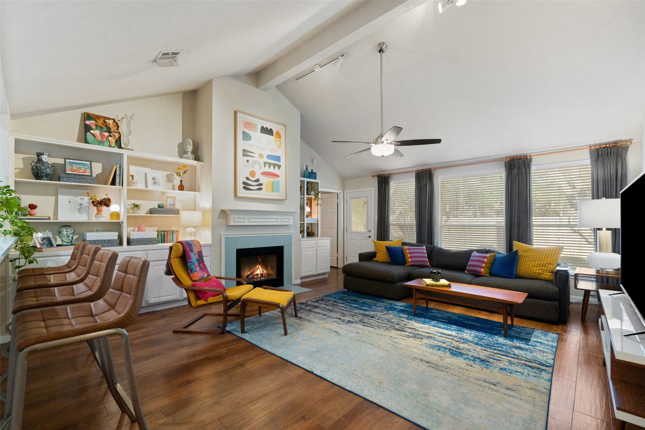11016 Amaranth Lane Austin, TX 78754 - Photo 5 of 36 a living room with furniture fireplace and a large window