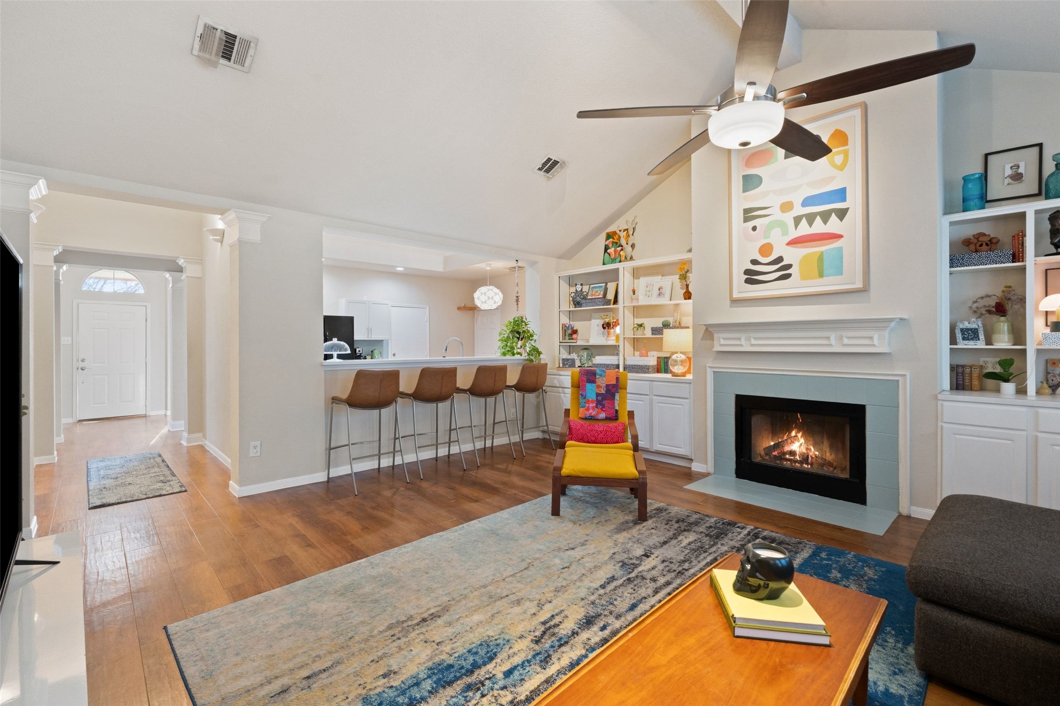 11016 Amaranth Lane Austin, TX 78754 - Photo 6 of 36 a living room with furniture and a fireplace