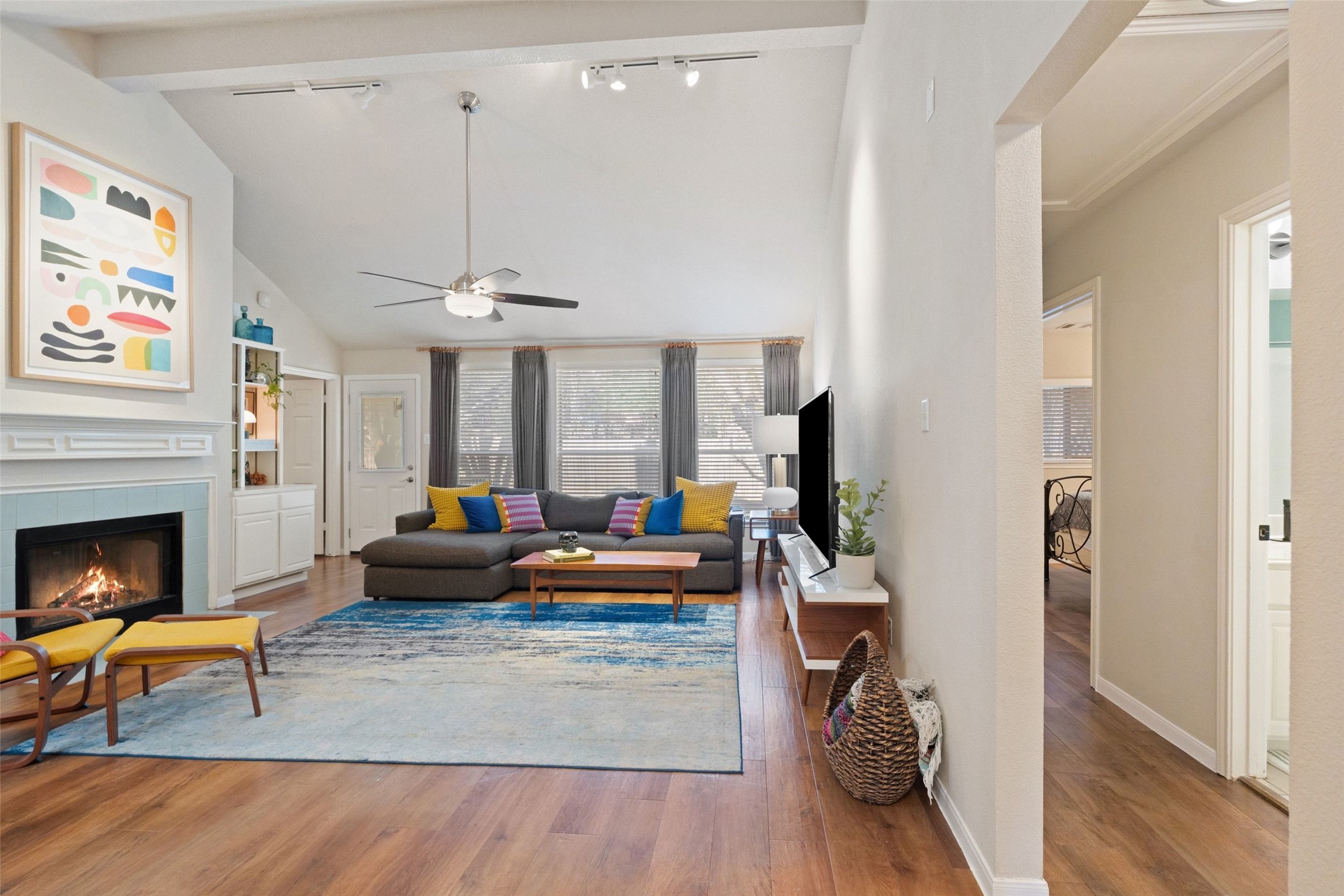 11016 Amaranth Lane Austin, TX 78754 - Photo 9 of 36 a living room with furniture and a fireplace