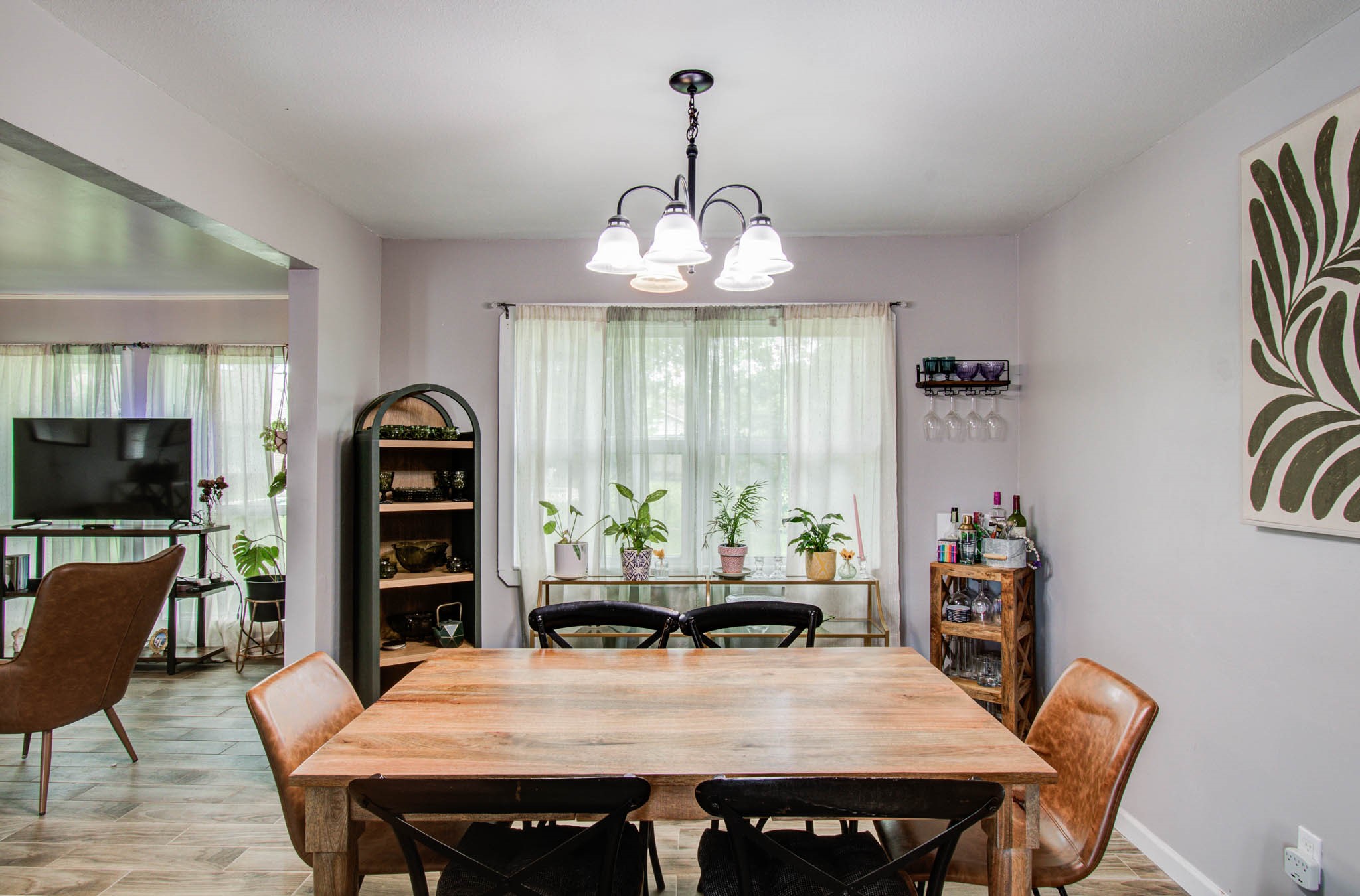 1327 Fallbrook Drive Houston, TX 77038 - Photo 15 of 34 a view of a dining room with furniture window and wooden floor