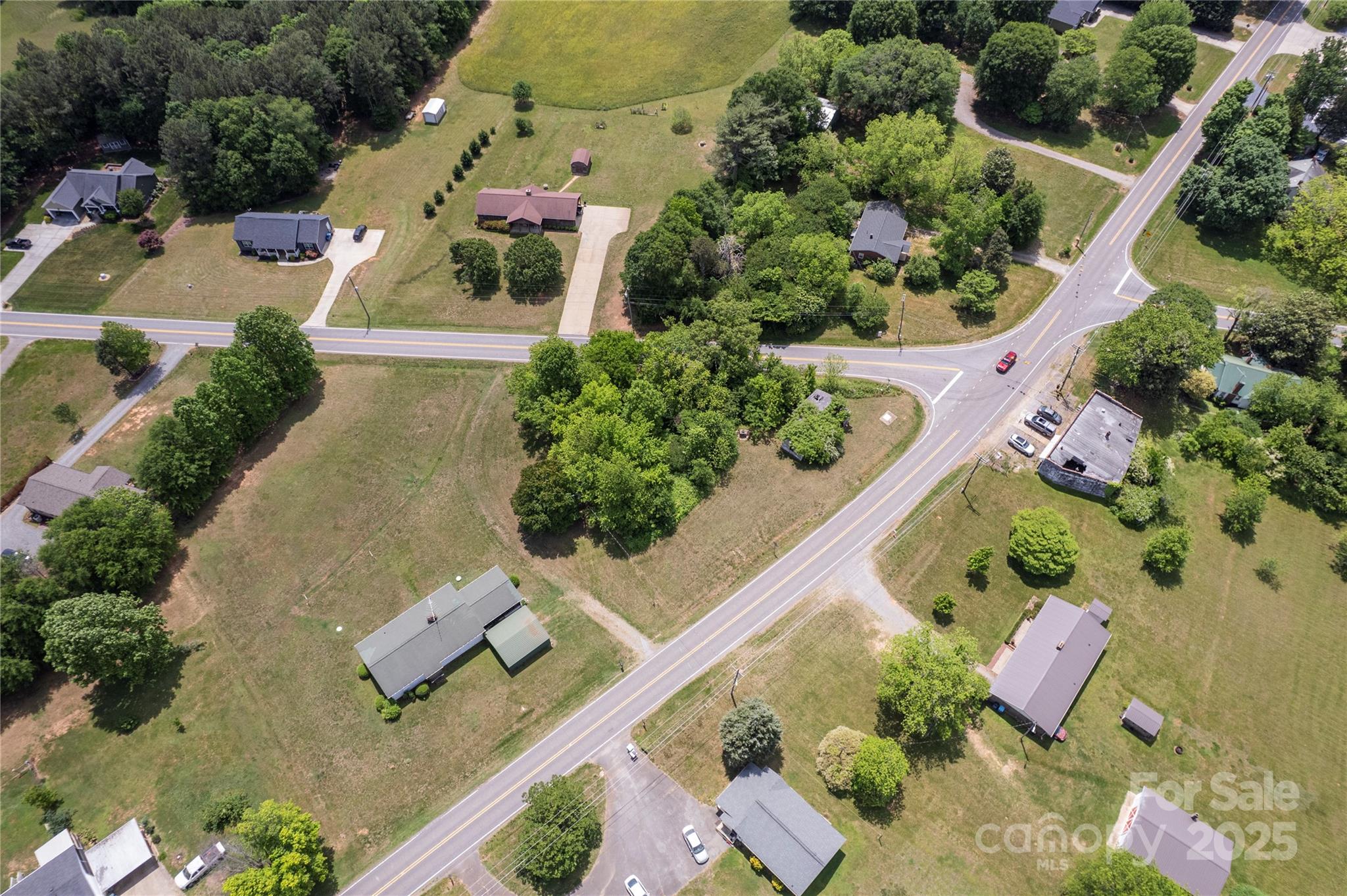 1558 Buffalo Shoals Road Catawba, NC 28609 - Photo 3 of 7 an aerial view of a house with a yard and garden