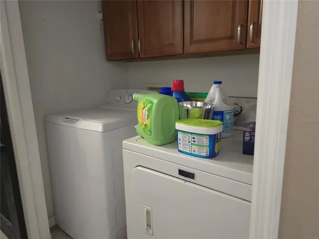 a kitchen with a stove and a microwave