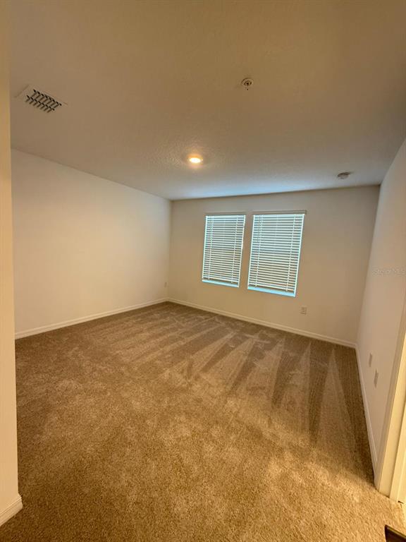 5040 Spangle Drive St. Cloud, FL 34769 - Photo 15 of 17 a view of an empty room with a window
