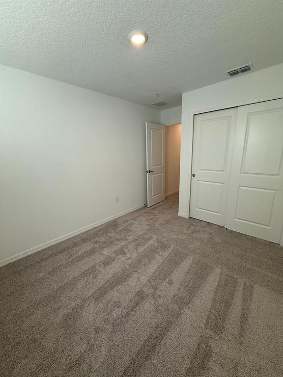 5040 Spangle Drive St. Cloud, FL 34769 - Photo 8 of 17 a view of an empty room