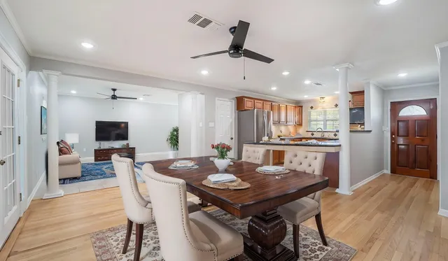a view of a dining room with furniture