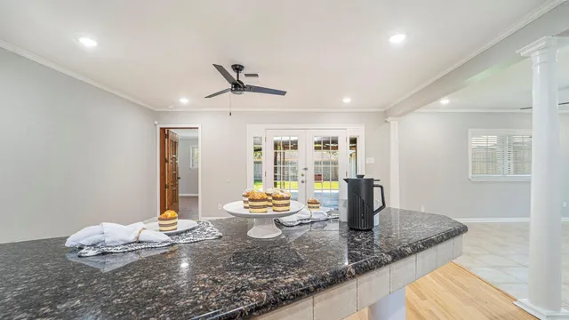 a dining room with wooden floor