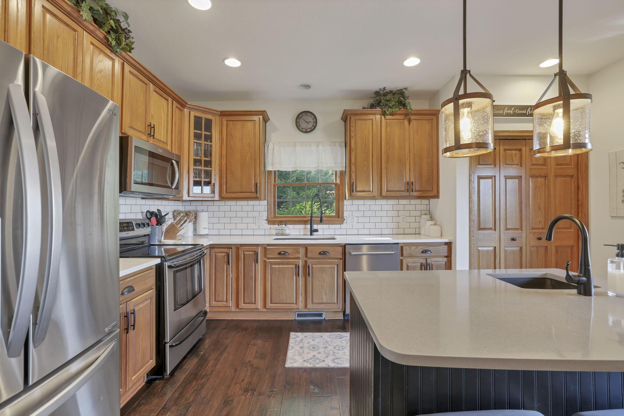 4333 Harris Road Butler, OH 44822 - Photo 15 of 53 Kitchen with quartz countertops