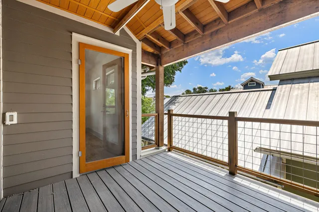 a view of a storage and utility room with washer and dryer