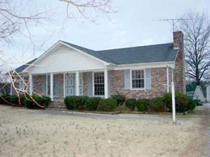 3022 McManus Road Monroe, NC 28112 - Photo 1 of 1 a front view of a house with garden