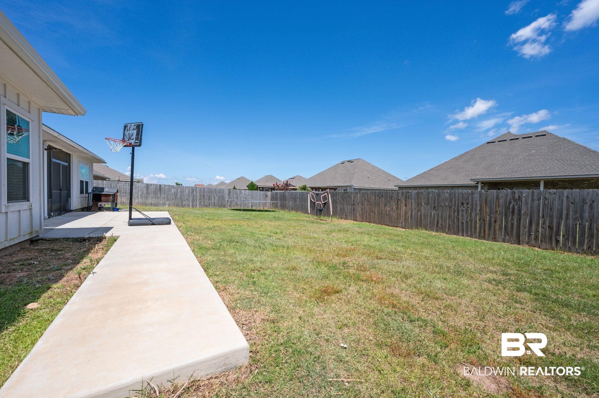 10169 Dunleith Loop Daphne, AL 36526 - Photo 14 of 40 Fenced backyard with a patio