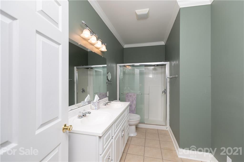 937 Ashley Road Chester, SC 29706 - Photo 22 of 48 a bathroom with a sink a toilet and shower