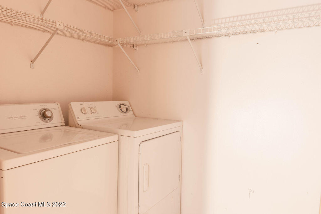 1880 Murrell Road, Unit 18 Rockledge, FL 32955 - Photo 16 of 26 a utility room with dryer and washer