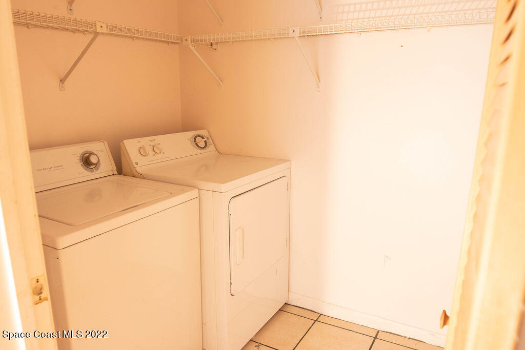 1880 Murrell Road, Unit 18 Rockledge, FL 32955 - Photo 17 of 26 a utility room with dryer and washer