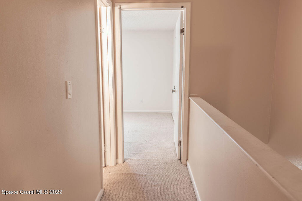 1880 Murrell Road, Unit 18 Rockledge, FL 32955 - Photo 18 of 26 a view of a hallway