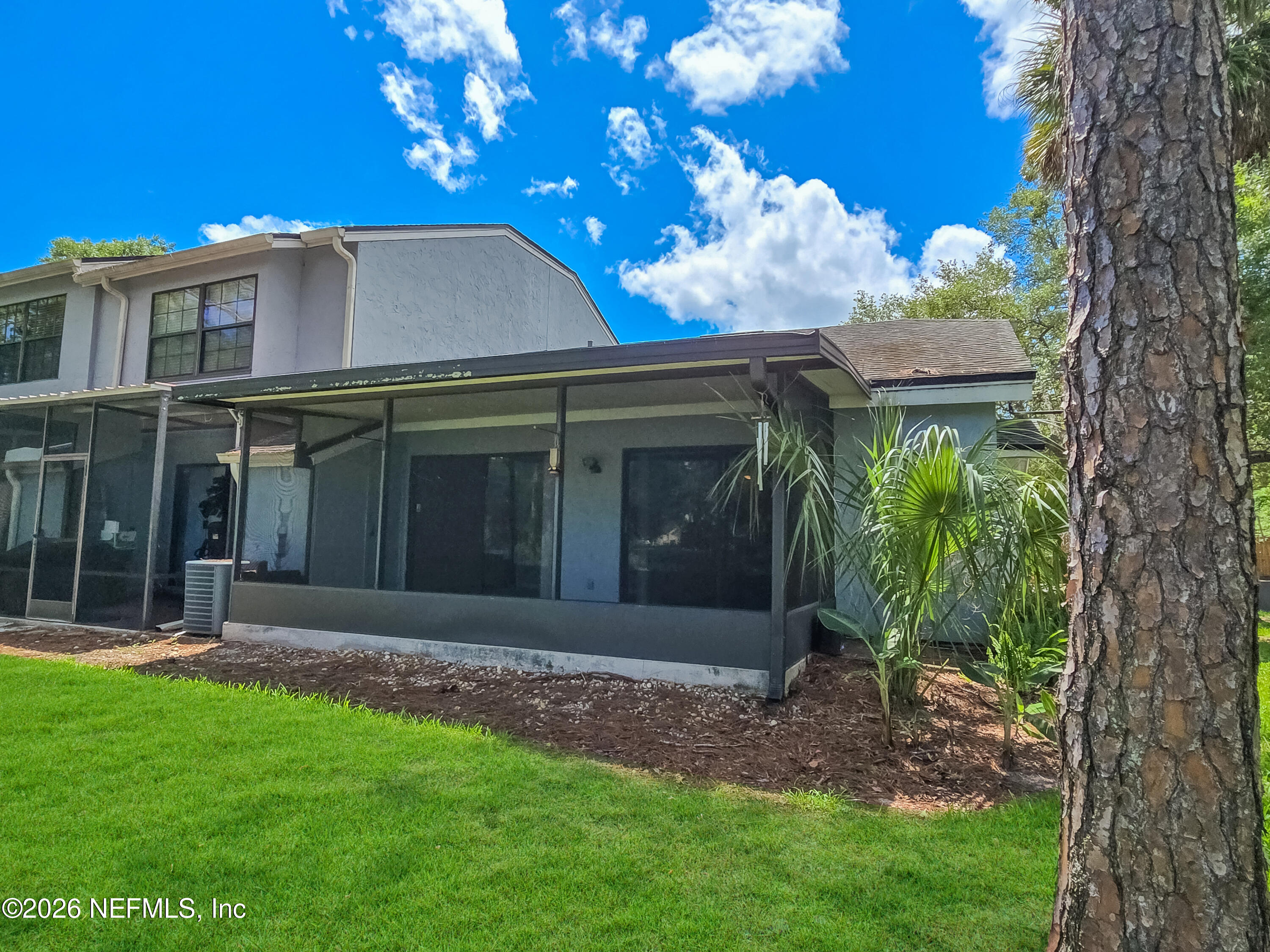 8715 Belle Rive Boulevard, Unit 1501 Jacksonville, FL 32256 - Photo 21 of 23 Rear