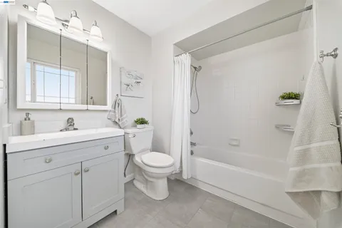 a view of a backyard with sitting area