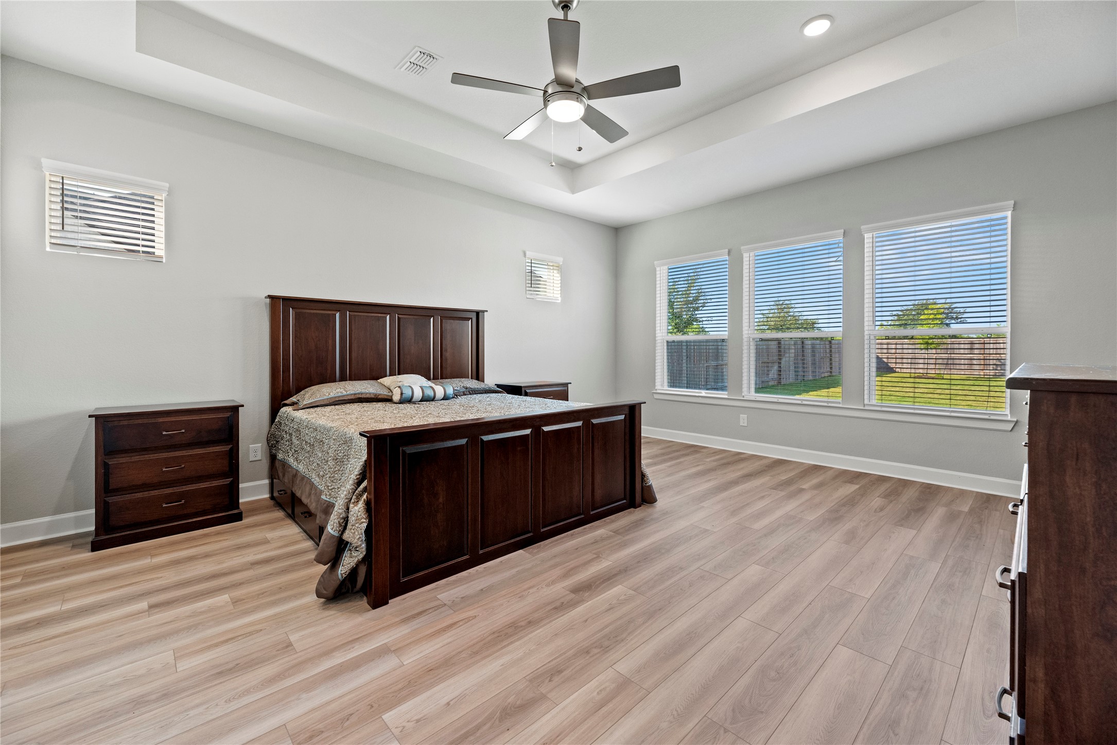 3111 Swift Way Katy, TX 77493 - Photo 36 of 50 a living room with a bed furniture and a large window