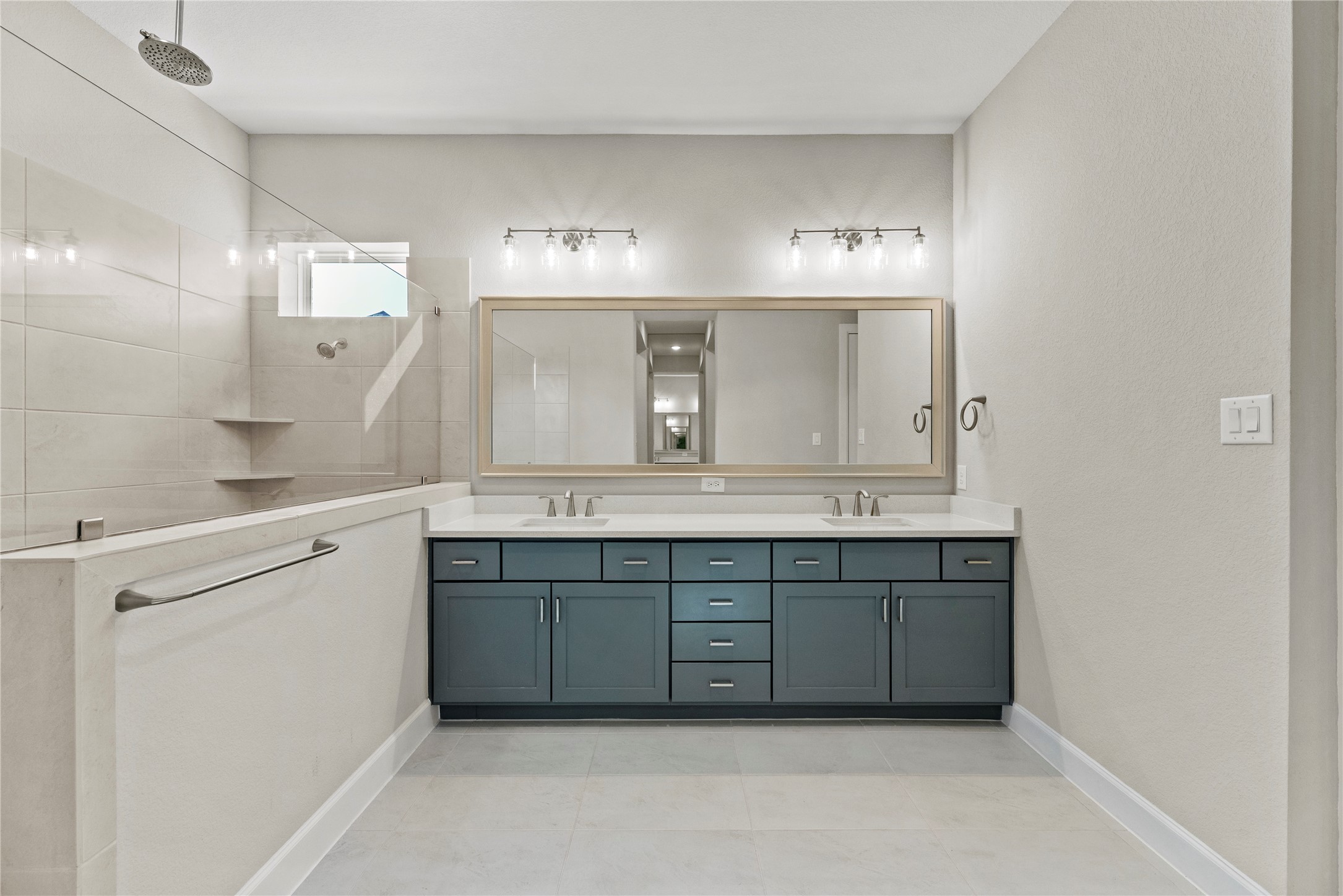 3111 Swift Way Katy, TX 77493 - Photo 38 of 50 a spacious bathroom with a granite countertop sink and a mirror