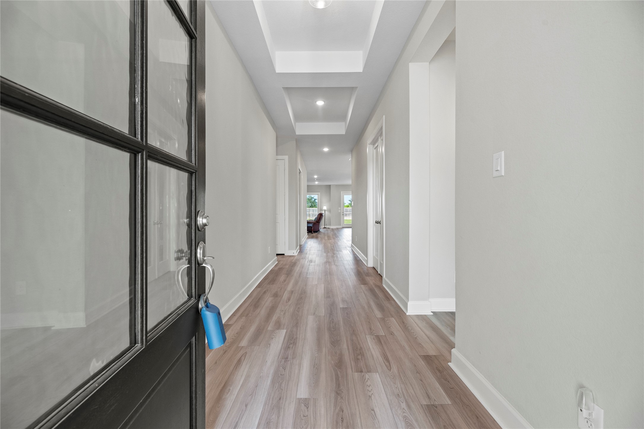 3111 Swift Way Katy, TX 77493 - Photo 6 of 50 a view of a hallway with wooden floor and staircase