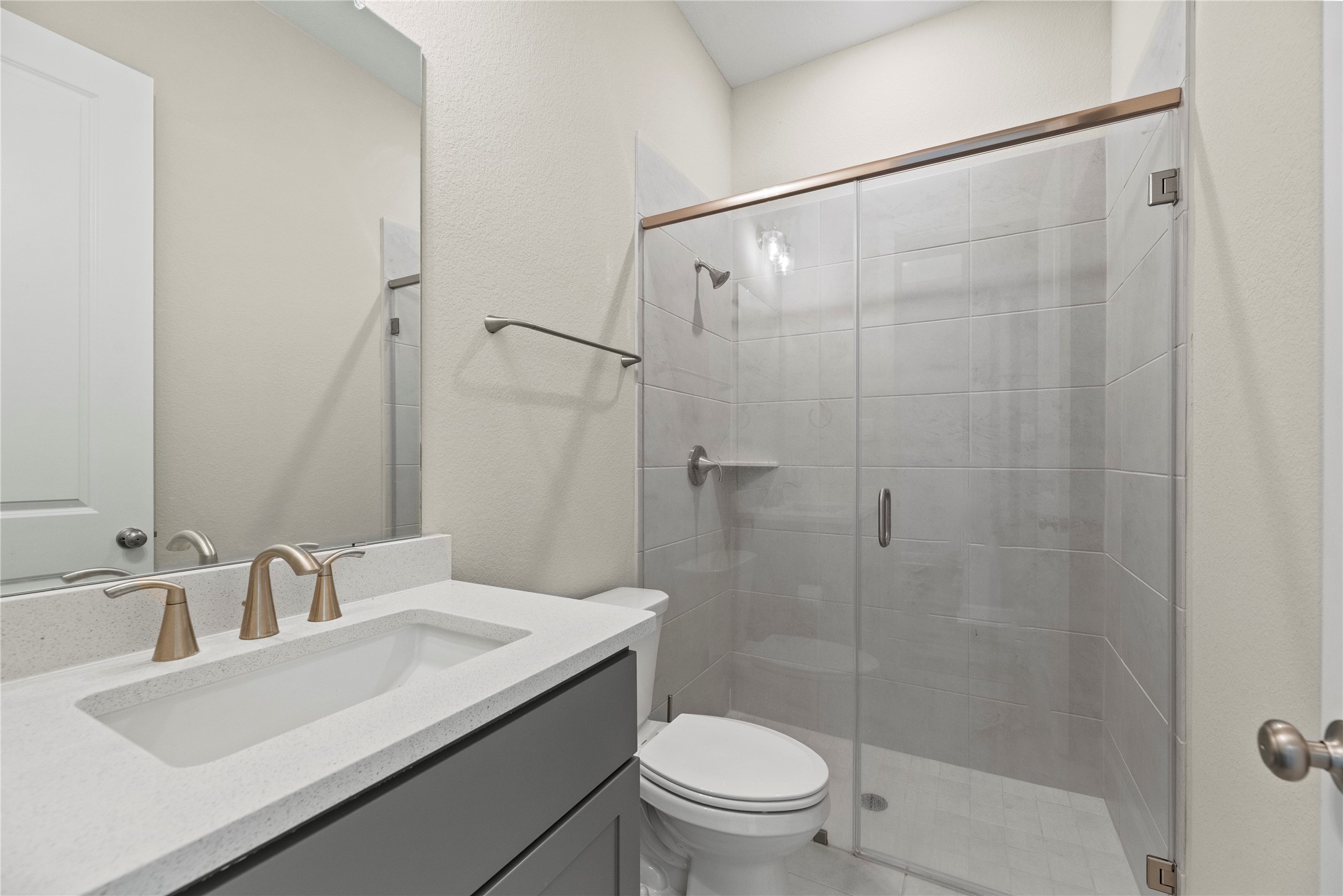 3111 Swift Way Katy, TX 77493 - Photo 9 of 50 a bathroom with a sink toilet and shower