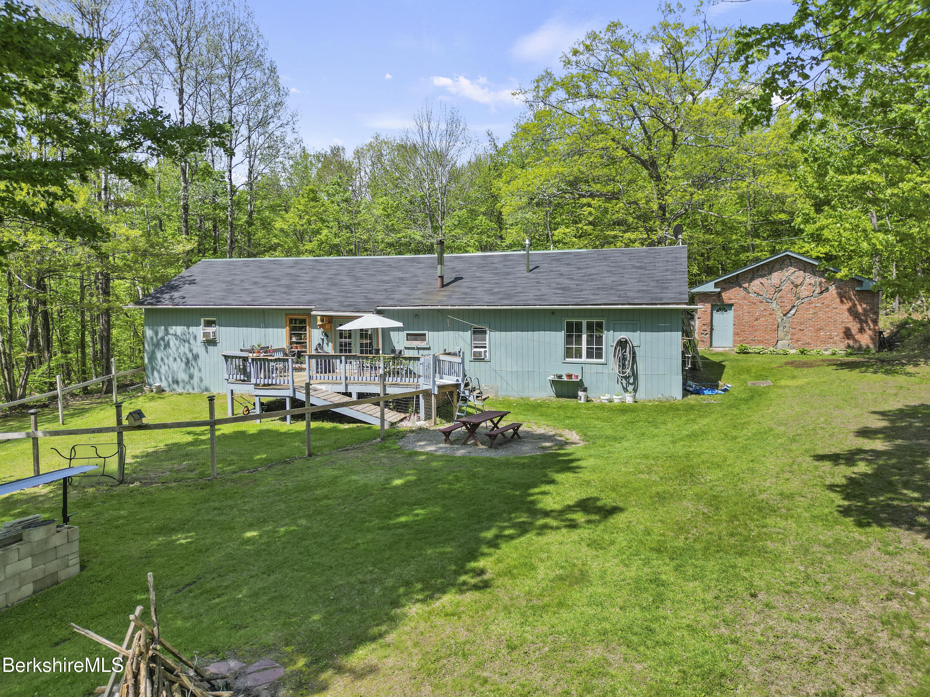 192 Curran Road Cheshire, MA 01225 - Photo 50 of 50 a view of a house with a yard porch and sitting area
