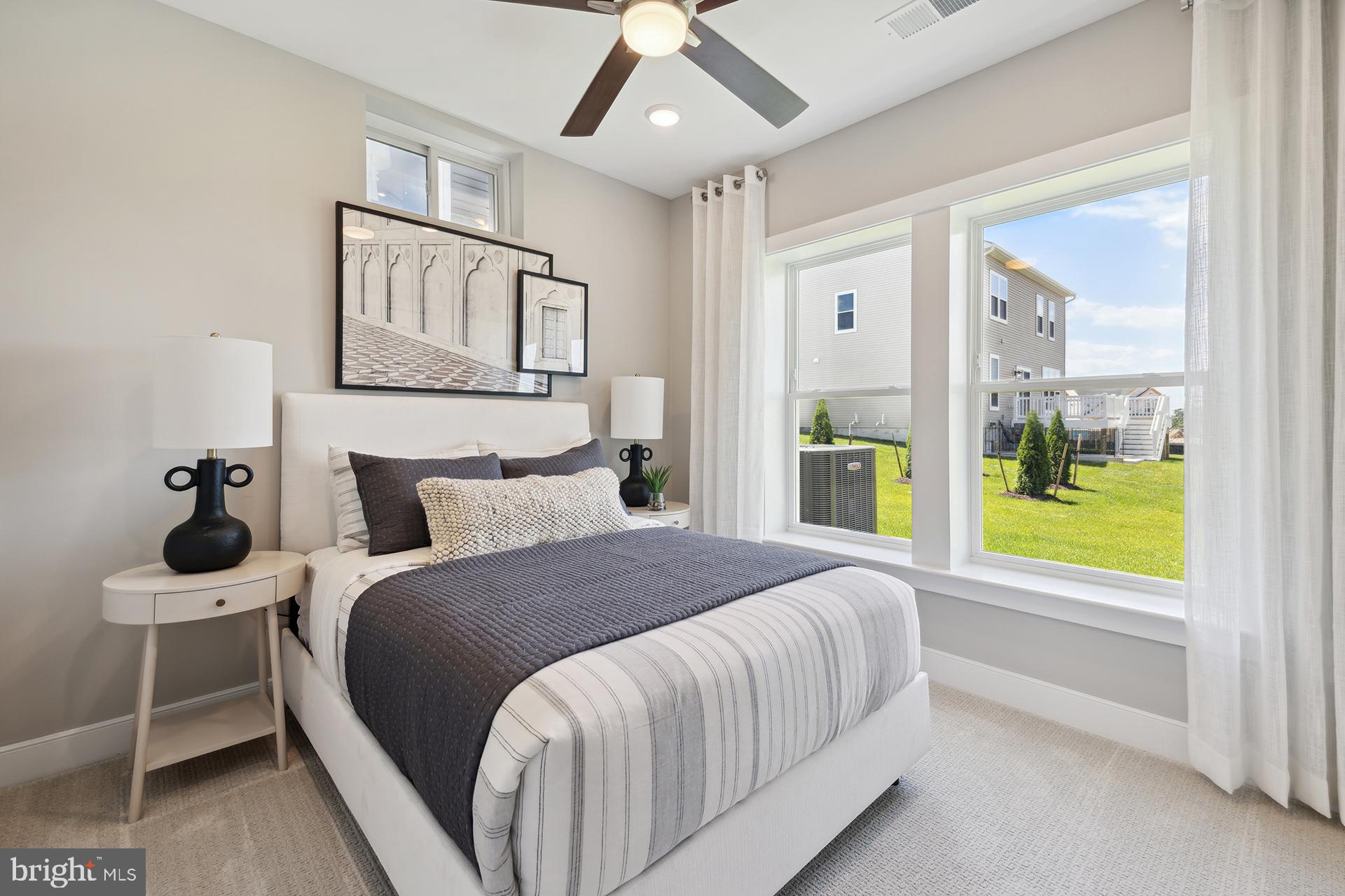 14406 Dowitcher Way, Unit 1 Boyds, MD 20841 - Photo 20 of 50 a bedroom with a bed and a window