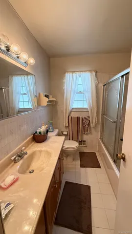 a kitchen with a sink appliances and cabinets