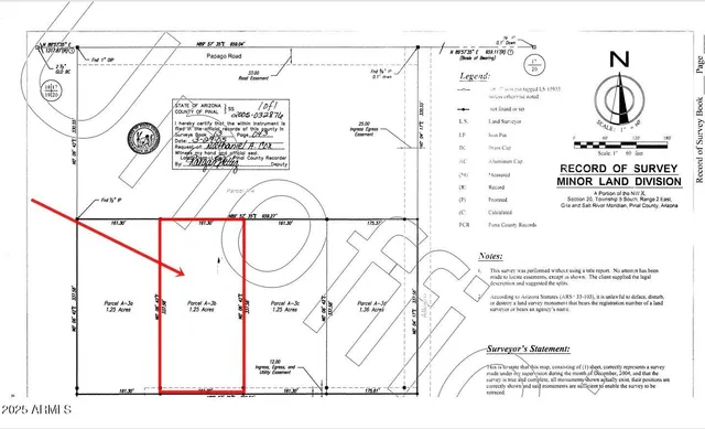 a picture of a bathroom with a shower and a mirror