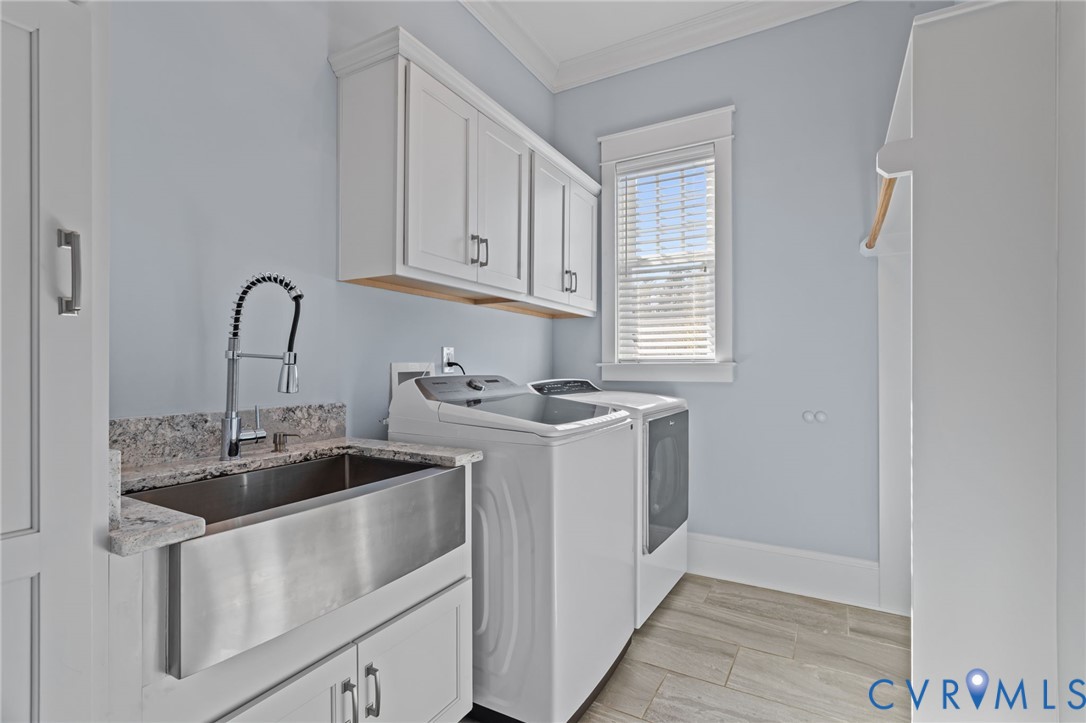 2313 Cheverton Lane Midlothian, VA 23112 - Photo 22 of 62 a kitchen with stainless steel appliances granite countertop a sink stove and white cabinets with wooden floor