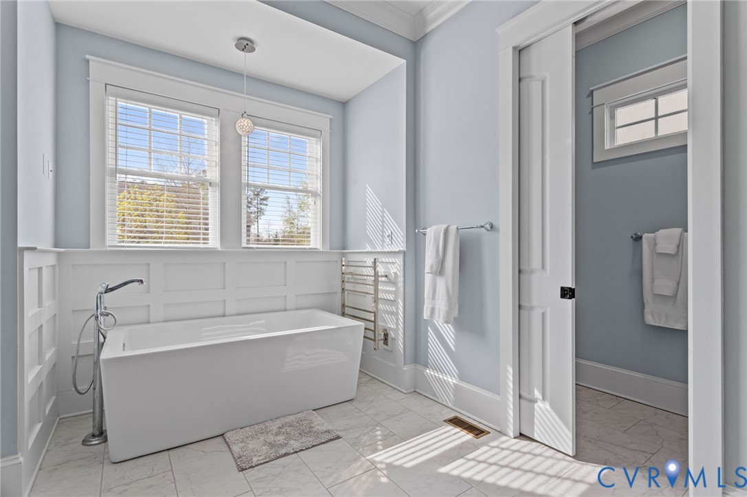 2313 Cheverton Lane Midlothian, VA 23112 - Photo 26 of 62 a bathroom with a bathtub and a shower