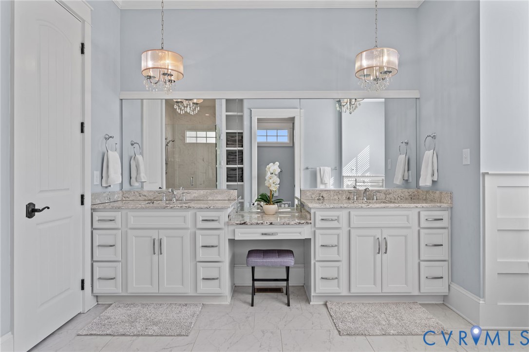 2313 Cheverton Lane Midlothian, VA 23112 - Photo 28 of 62 a bathroom with a sink and a mirror