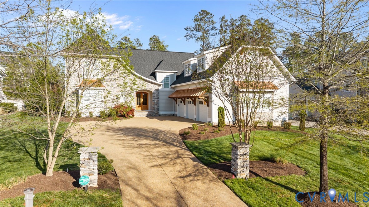 2313 Cheverton Lane Midlothian, VA 23112 - Photo 3 of 62 Stunning curb appeal with stone accents, copper aw