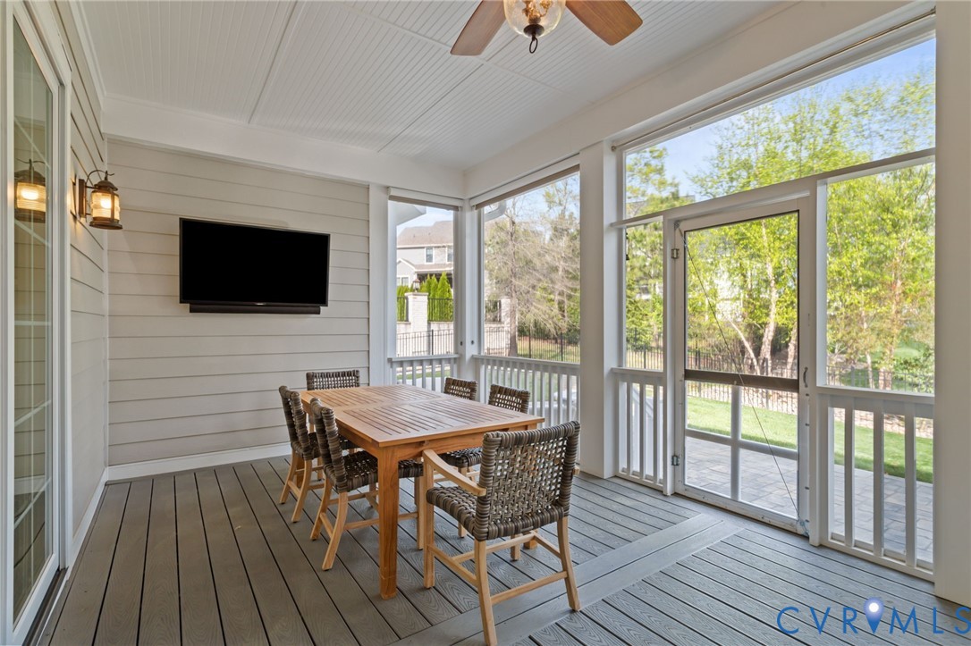 2313 Cheverton Lane Midlothian, VA 23112 - Photo 46 of 62 a view of a dining room with furniture window and wooden floor