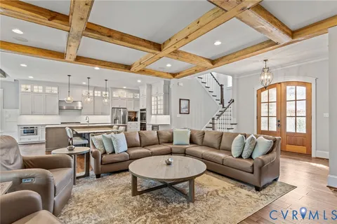 a kitchen with granite countertop stainless steel appliances and refrigerator