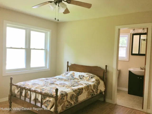a view of balcony with furniture and trees