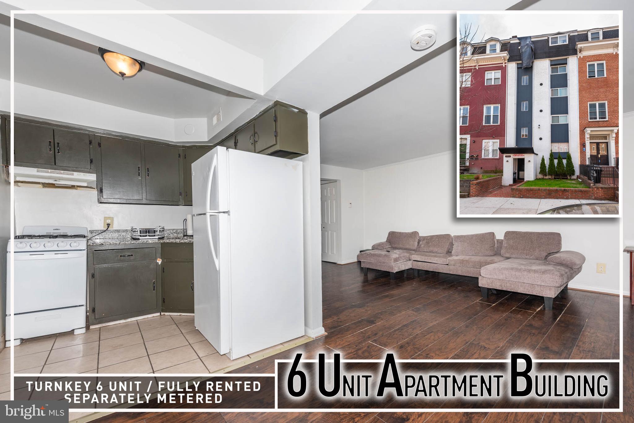 a kitchen with stainless steel appliances granite countertop a refrigerator and a stove