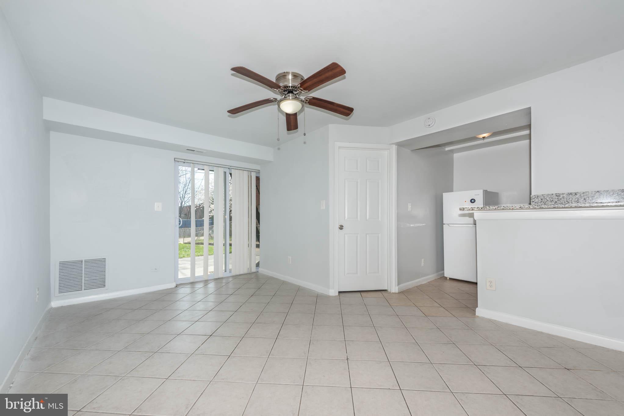 1911 West Baltimore Street Baltimore, MD 21223 - Photo 2 of 32 a view of an empty room with a window