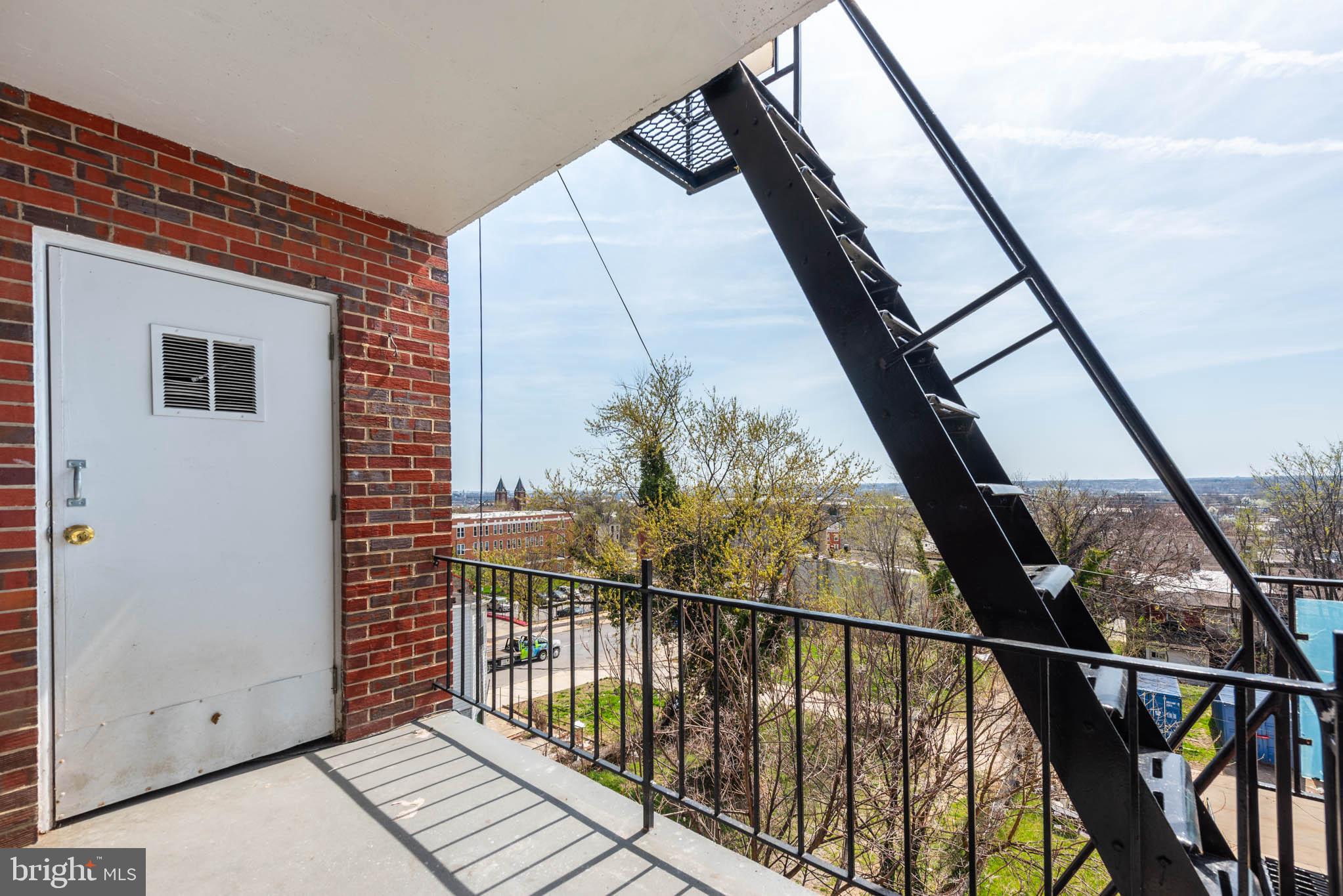 1911 West Baltimore Street Baltimore, MD 21223 - Photo 23 of 32 a view of balcony with wooden floor