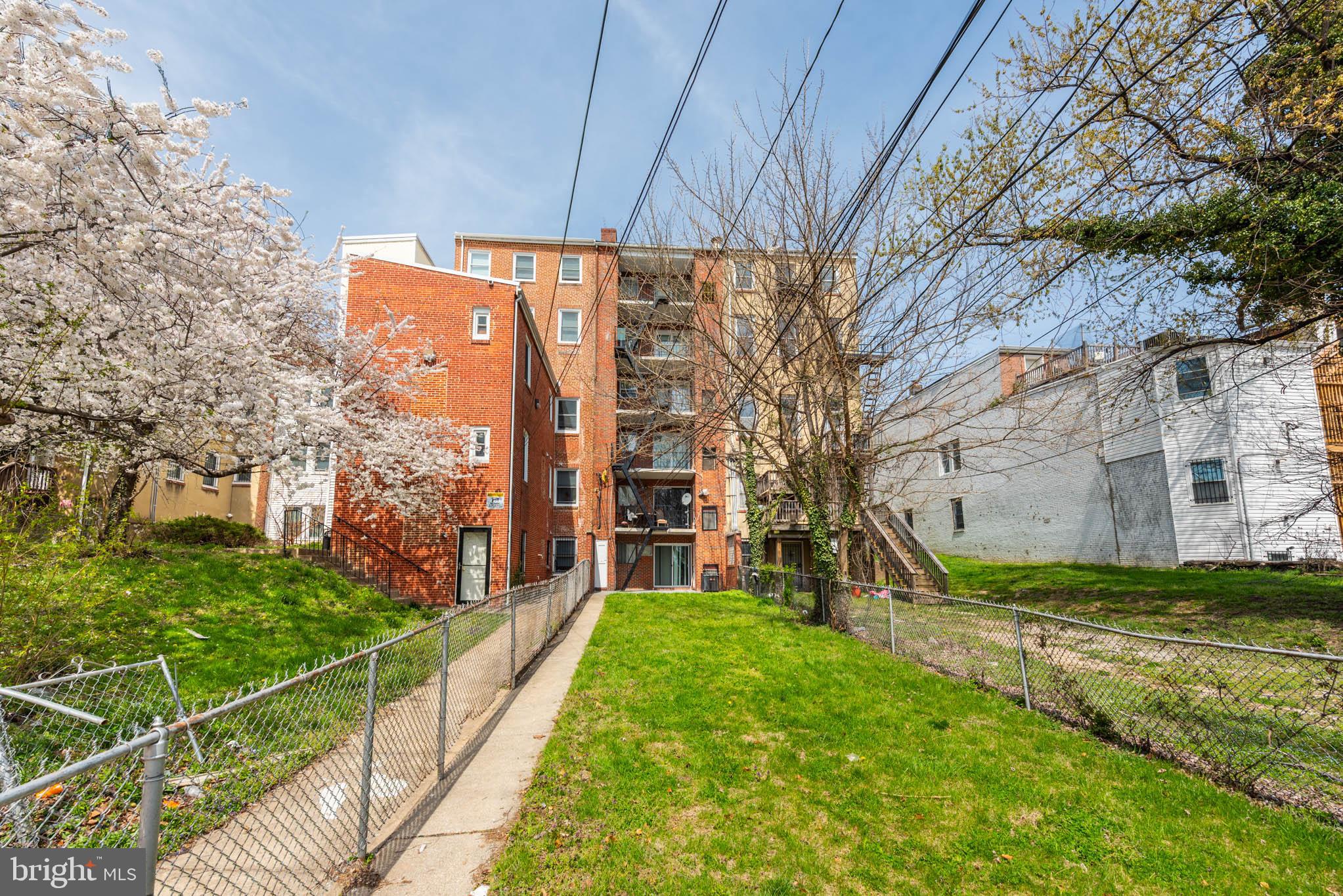 1911 West Baltimore Street Baltimore, MD 21223 - Photo 27 of 32 a view of a house with a yard and pathway