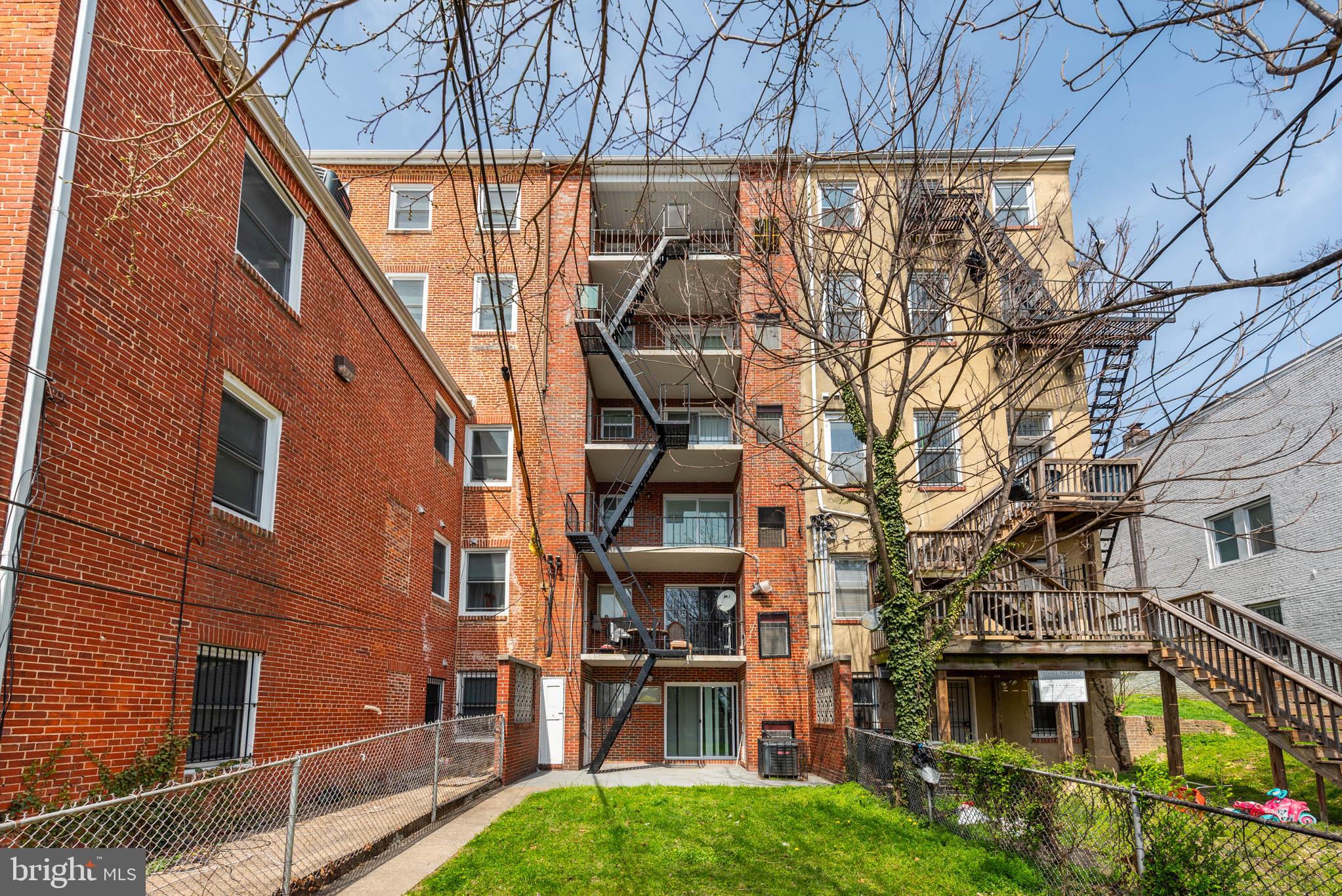 1911 West Baltimore Street Baltimore, MD 21223 - Photo 28 of 32 front view of a building with a yard