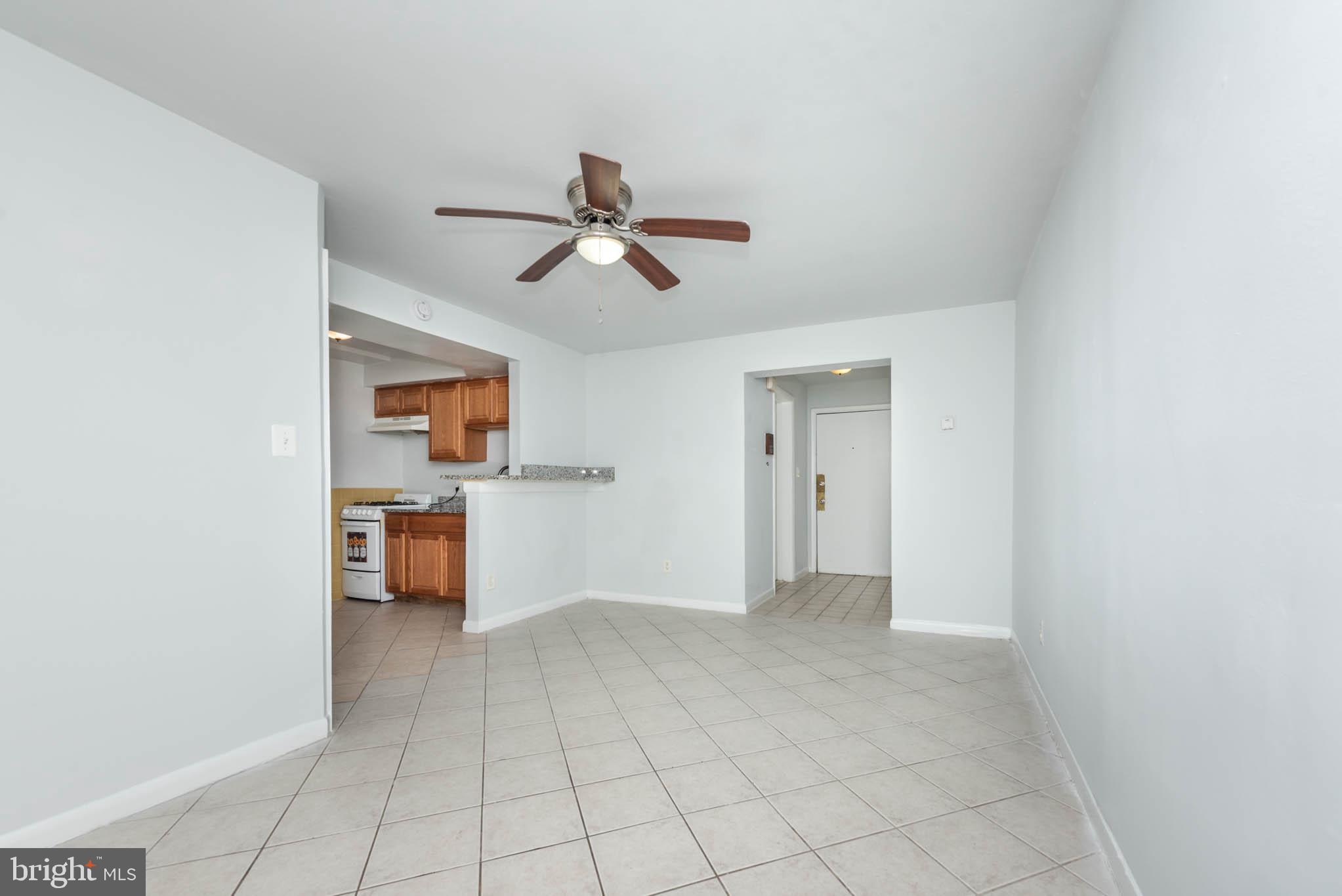 1911 West Baltimore Street Baltimore, MD 21223 - Photo 3 of 32 a view of a room with a sink and a window